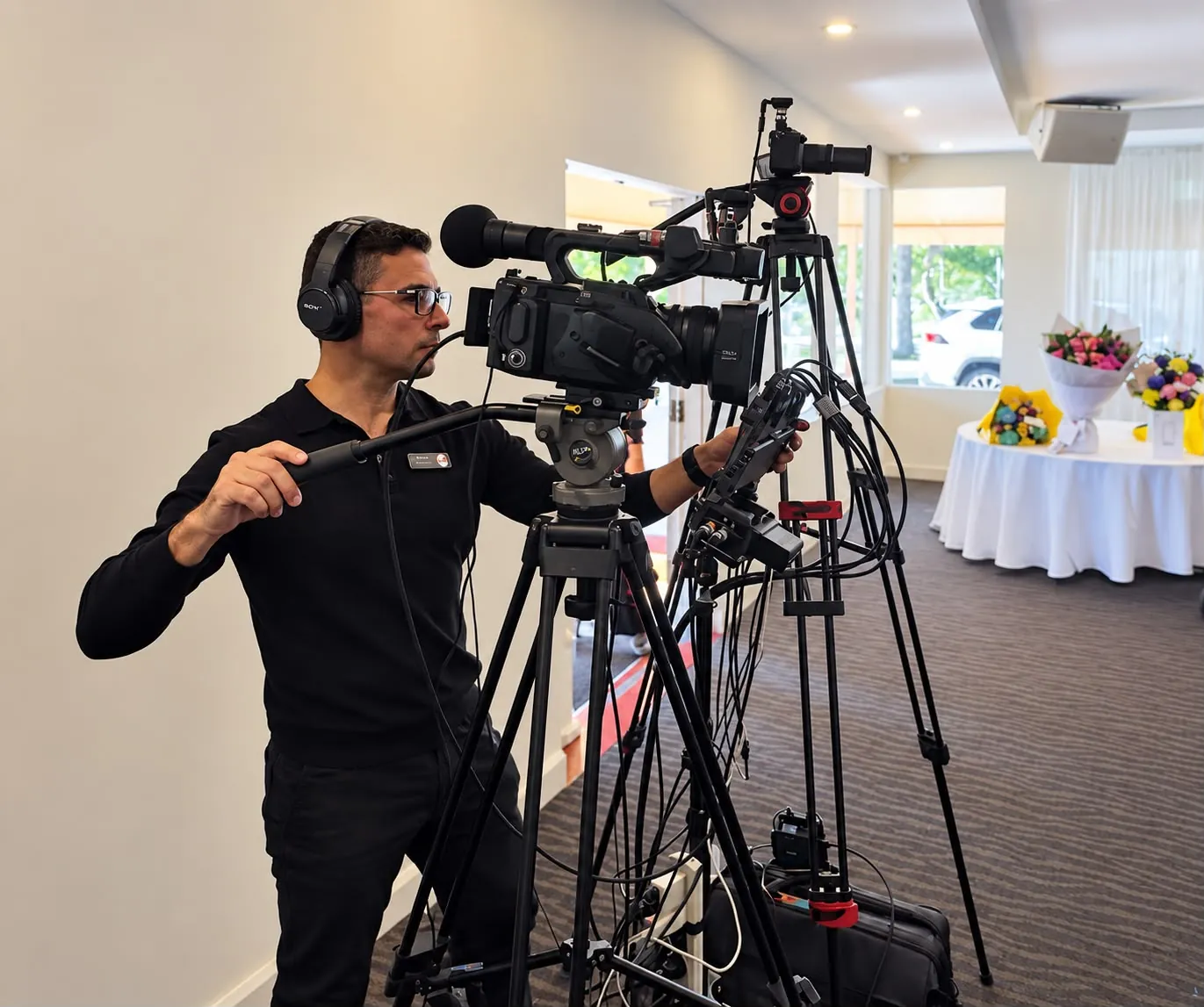 Warren operating the camera at a service